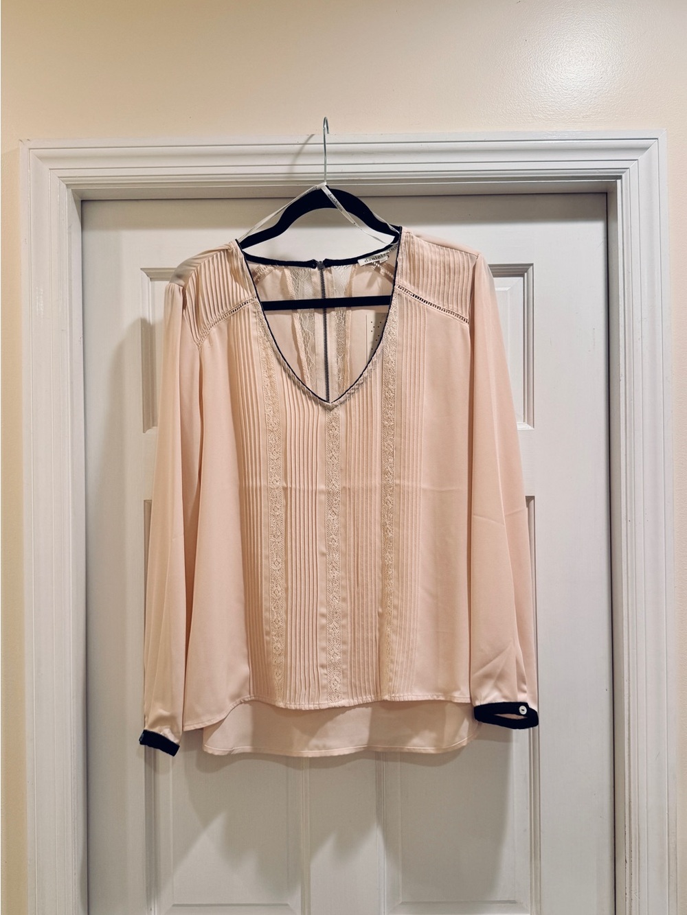 Daniel Rainn Blush Cream V‑Neck Pintuck Blouse with Black Trim Accents